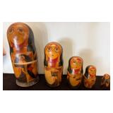 Three Sets of Painted Wooden Nesting Dolls