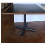 Square Black Table With Wooden Trim and Metal Base