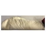 Folded Cream-Colored Fabric or Blanket