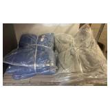 Bagged Blue and Gray Dog Clothing Items