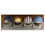 Four Vintage Football Helmets with Facemasks