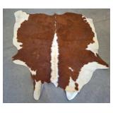Brown and White Cowhide Rug, Approx. 60x64