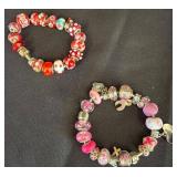 Two Beaded Charm Bracelets With 