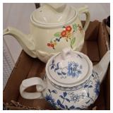 Two Ceramic Teapots with Floral Designs
