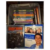 DVDs in Plastic Storage Container