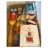 Disney-Themed Collectibles and Hallmark Ornament