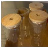 Four Glass Jars with Bamboo Lids