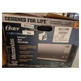 Oster 1.3 Cu. Ft. Countertop Microwave Oven