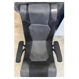 Black Gaming Chair with Integrated Audio Controls