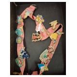 Pink Lanyard with Assorted Disney-Themed Pins