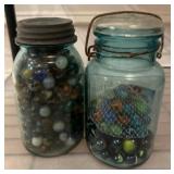 Two Mason Jars with Assorted Glass Marbles