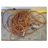 Two Orange Electrical Extension Cords