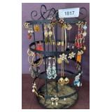 Black Rotating Earring Display With Assorted Earri