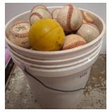 Plastic Bucket With Baseballs and Yellow Ball