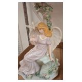 Porcelain Angel Figurine with Floral Accents