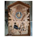 Carved Wooden Cuckoo Clock With Pinecone Weights