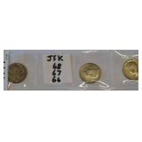 Three Kennedy Half Dollar Coins