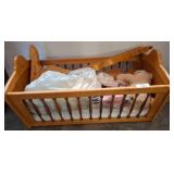 Wooden Cradle with Assorted Items