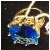 Gold Ring with Blue Sapphire and Filigree Setting