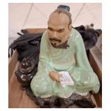 Ceramic Figurine with Assorted Leather Gloves