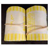 Two Rolls of Presumably Unsearched Half Dollars