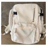 White Backpack with Multiple Zippered Compartments