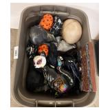 Plastic Bin of Halloween-Themed Decorations