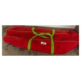 Red Storage Bag With Christmas Wrapping Paper