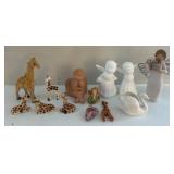 Figurines Including Angels and Giraffes