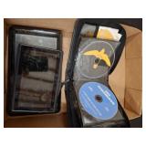Two Tablets and Multiple cds in Case