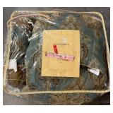 Comforter and Throw Pillows in Plastic Case