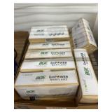 Boxes of NewLeaf Soft White Light Bulbs