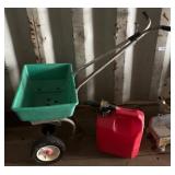 Fertilizer Spreader and Red Plastic Gas Can