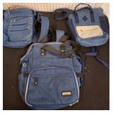 Three Blue Canvas Backpacks