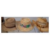 Three Straw Hats with Varying Designs