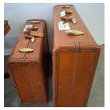 Two Leather Suitcases With Brass Hardware