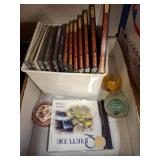CDs and Two Glass Paperweights
