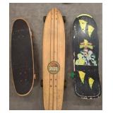 Three Skateboards with Varied Graphics