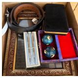 Box Lot: Frames, Belt, Pens, and Stress Balls