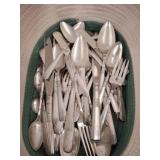 Flatware in a Textile Storage Basket