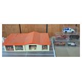 Die-Cast Cars and Plastic Garage Lot