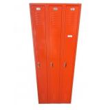 Three-Door Orange Metal Locker Unit