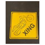 Yellow Metal Motorcycle Xing Sign