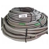 Coiled Armored Electrical Cable Bundle