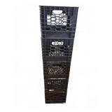 Stack of Four Black Plastic Milk Crates