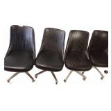 Four Black Swivel Office Chairs