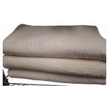 Three White Quilted Blankets