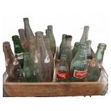 Glass Soda Bottles in Wooden Crate