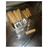 BINS OF STEAK KNIVES