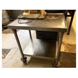30" X 24" SS TABLE ON WHEELS